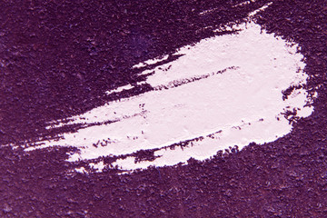 White stain on purple plaster. Can be used as a background.