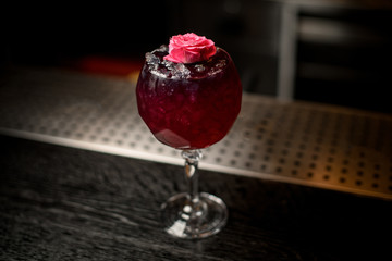 Close-up of alcohol drink decorated with flower