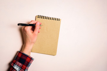 Man writing by left hand