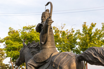Naklejka premium Details of Monument of King Gyeongdeok sitting on his horse and fighting with the bow. Geumseong-myeon, Uiseong County, South Korea, Asia.