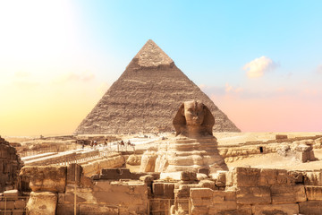 Ruins of the temple of Giza with the Sphinx and the Pyramid of Khafre,  Egypt - obrazy, fototapety, plakaty