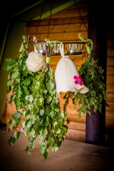 Birch, juniper,oak tree sauna whisks brooms ( also known as vasta, vihta or venik) hanging and drying. Felt woman sauna hat at sponge. Sauna hat keeps hair from damaging and head from overheating.