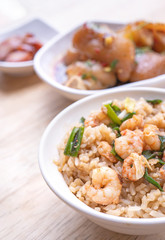 Braised shrimp over rice - Taiwan famous traditional street food. Soy-stewed prawn on cooked rice. Travel concept, top view, copy space, close up