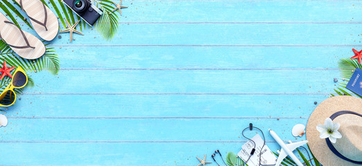 Summer travel accessories on blue wood background 3D Rendering