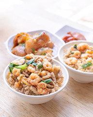 Braised shrimp over rice - Taiwan famous traditional street food. Soy-stewed prawn on cooked rice. Travel concept, top view, copy space, close up