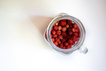 Jar with strawberries on a white background 3