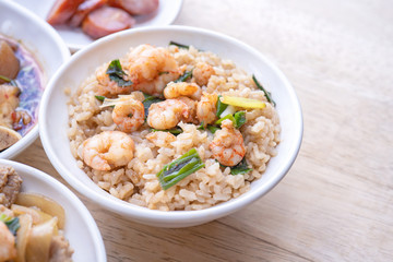 Braised shrimp over rice - Taiwan famous traditional street food. Soy-stewed prawn on cooked rice. Travel concept, top view, copy space, close up