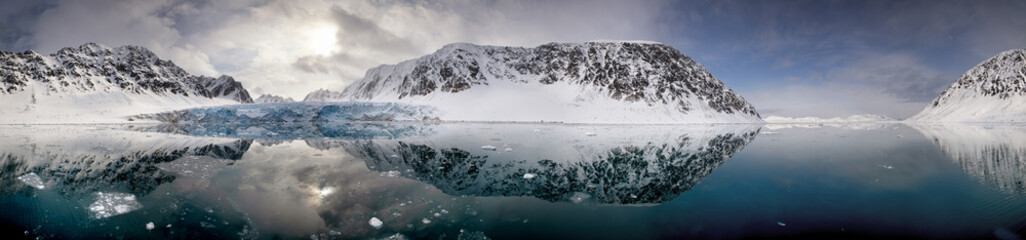 Fototapeta na wymiar Ultra wide panorama of Kongsvegen glacier in Svalbard