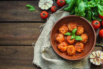 meatballs in tomato sauce (meat dish). food background. top view. copy space