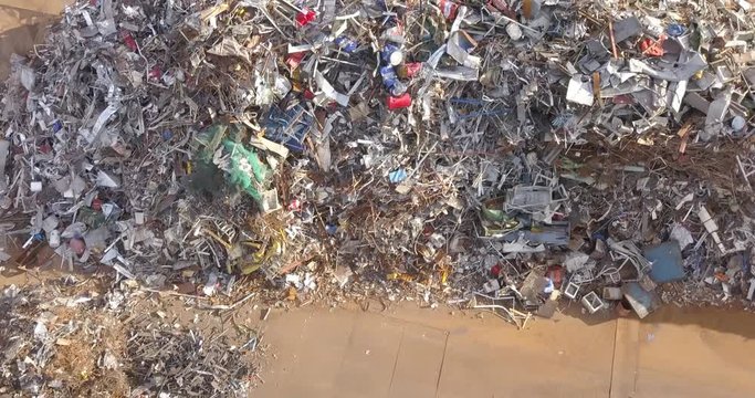 Aerial view of a pile of metallic waste on a recycling area.
