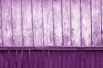 Old grunge wooden fence and wooden wall pattern in purple tone.