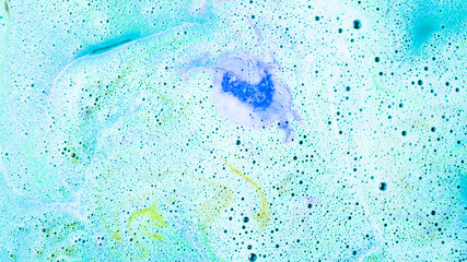 Blue body care bubble bath bomb background