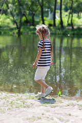 Young girl posing outdoors. Concept of summer,childhood and leisure