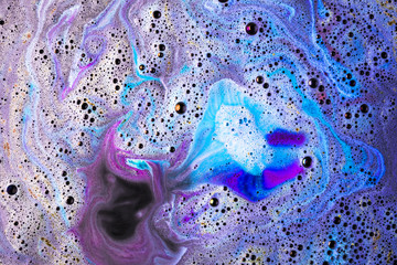 Brightly blue and pink bath bomb surface backdrop