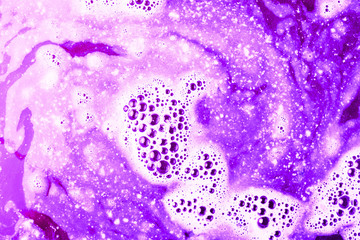 Full frame of purple bath bomb water background
