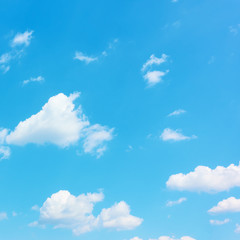 Naklejka na ściany i meble Blue sky with light white clouds