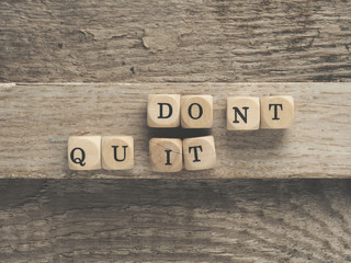 Naklejka premium Dont quit do it on wooden blocks