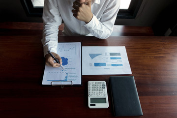 Businessmen calculate investment expansion business, saving money .finance concept.