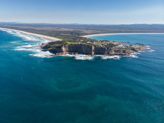 Fototapeta na wymiar Drone picture of two huge beach in a coast with forest and city