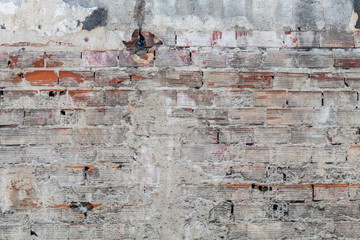 Old Weathered Concrete Decay Wall Texture With Red Bricks Visible