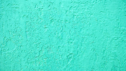 Grunge wall with cracks and peeling paint. Textured wooden background.