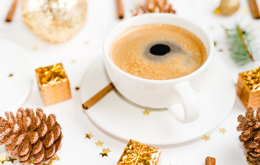 Creative natural layout of Christmas decorations with cups of coffee on a white background. Flat lay, Top view