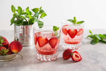 Refreshing Ice Cold Strawberry Lemonade on a white background. Summer time