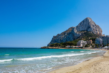 Sand beach and Natural Park of Penyal d'Ifac on background, Calpe, Spain