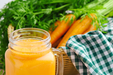 Carrot smoothie with parsley on a table