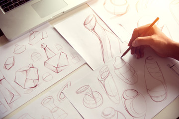 Production designer sketching Drawing Development Design product packaging prototype idea Creative...