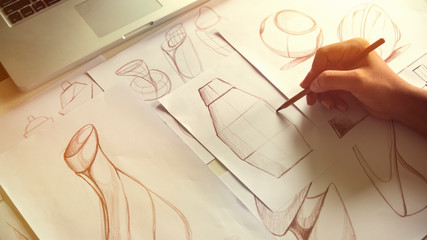 Production designer sketching Drawing Development Design product packaging prototype idea Creative...