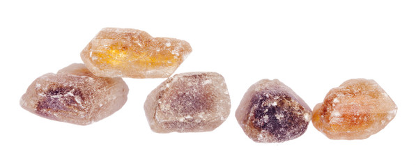 Pile of brown granulated sugar isolated on white background