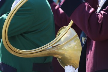 Close up of musicians playing the hunting horn
