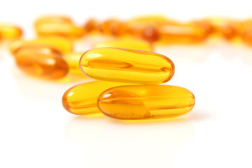 Omega-3 capsules on a white background. Fish oil, healthy supplements