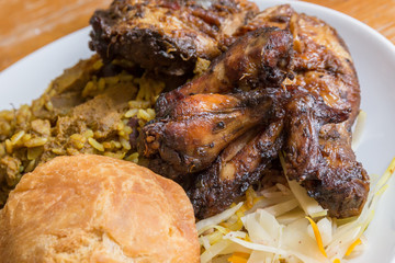Jamaican curry goat, jerk chicken and fried dumpling