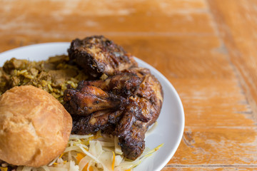 Jamaican curry goat, jerk chicken and fried dumpling