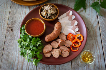 glass of alcohol and a snack