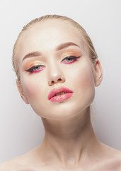 Fototapeta premium Portrait of beautiful woman with make up, studio shoot