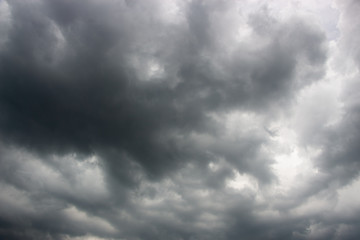 Obraz premium Light in the Dark and Dramatic Storm Clouds background