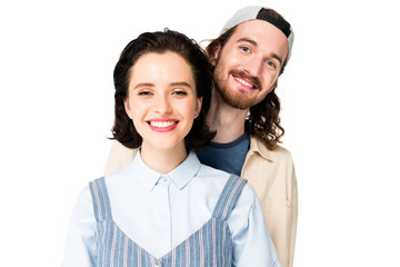 portrait shot of young couple smiling at camera isolated on white