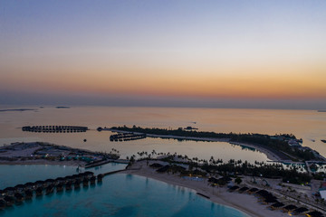 Aerial view, Maldives island with water bungalows, South Male Atoll Maldives