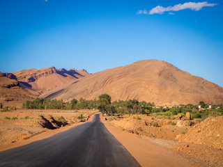 Fototapeta na wymiar Road in Atlas Mountains in Morocco. Journey through Morocco. road landscape