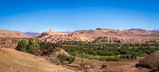 Fototapeta premium Amazing view of Kasbah Ait Ben Haddou near Ouarzazate in the Atlas Mountains of Morocco. UNESCO World Heritage Site since 1987. Artistic picture. Beauty world.