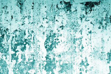 Сraked weathered cement wall texture in cyan tone.
