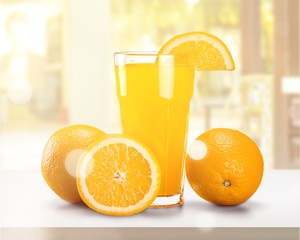 Orange juice and slices of orange on background © BillionPhotos.com