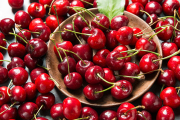 A bunch of red cherries on the plate