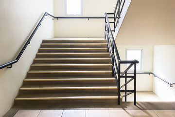 Beautiful and simple background image of  staircase for public. Interior architecture of public staircase with handrail made by steel pipe.