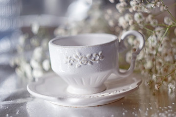 Obraz na płótnie Canvas Cup with tea on the table