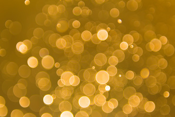 abstract gold background with soft blur bokeh light effect, background bokeh