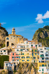 Architecture of Amalfi at sunny day. Italian seaside town on coastline of Tyrrhenian Sea. Summer in Italy